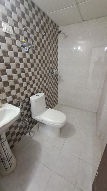 Bathroom in 3 BHK Builder Floor at Raj Nagar Extension – for Sale