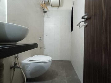 Bathroom in 2 BHK Apartment at Rustomjee Urbania, Majiwada – for Sale