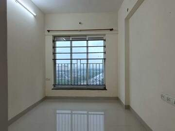 Bedroom in 2 BHK Apartment at Rustomjee Urbania, Majiwada – for Sale