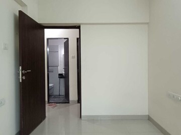 Bedroom in 2 BHK Apartment at Rustomjee Urbania, Majiwada – for Sale