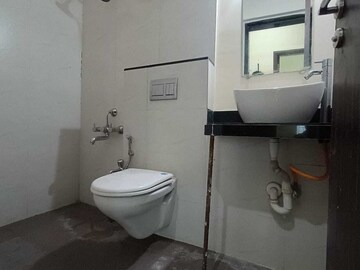 Bathroom in 2 BHK Apartment at Rustomjee Urbania, Majiwada – for Sale