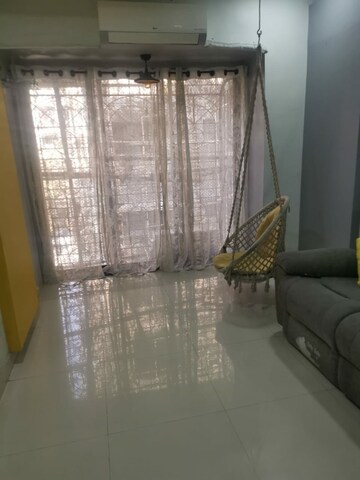 Living Room in 1 BHK Apartment at Raunak Unnathi Greens, Kasarvadavali – for Rent