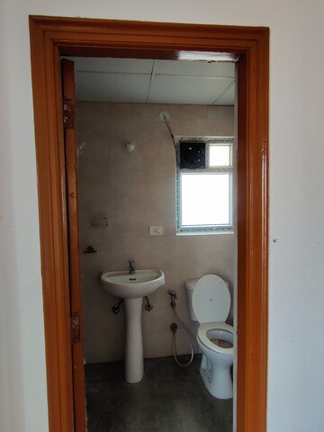 Bathroom in 2 BHK Apartment at Antriksh Golf City, Sector 150 – for Rent