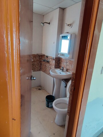 Bathroom in 2 BHK Apartment at Antriksh Golf City, Sector 150 – for Rent