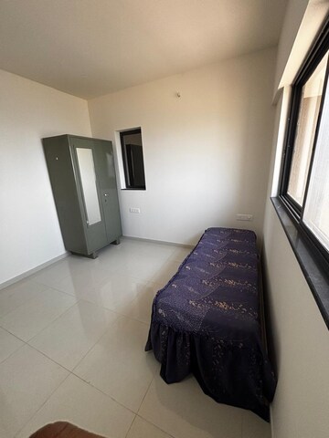 Living Room in 1 BHK Apartment at Shapoorji Pallonji Vanaha Golfland, Bavdhan – for Rent