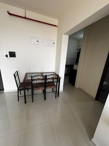 Living Room in 1 BHK Apartment at Shapoorji Pallonji Vanaha Golfland, Bavdhan – for Rent