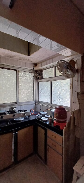Kitchen in 2 BHK Apartment at Malad SC CHS, Malad West – for Rent