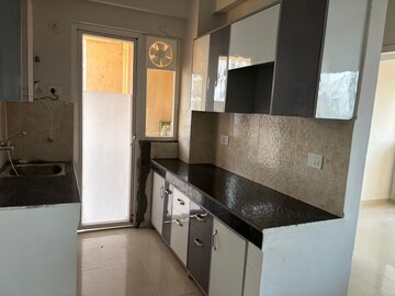 Kitchen in 2 BHK Apartment at ROF Aalayas, Sector 102 – for Rent