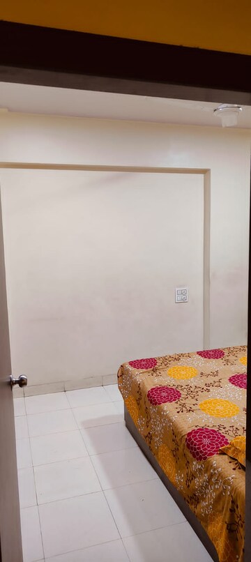 Bedroom in 2 BHK Apartment at Ekta Safalya CHS, Azad Nagar – for Sale