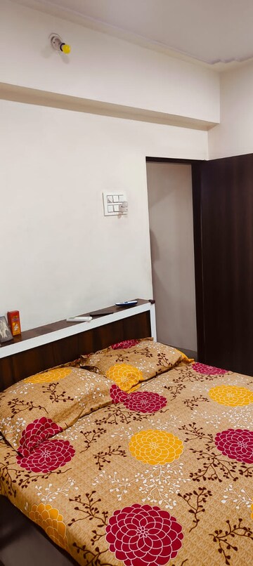 Bedroom in 2 BHK Apartment at Ekta Safalya CHS, Azad Nagar – for Sale