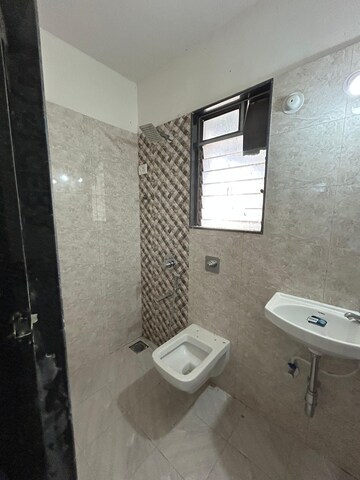 Bathroom in 2 BHK Apartment at Shree Sai Surya Kiran, Andheri West – for Rent