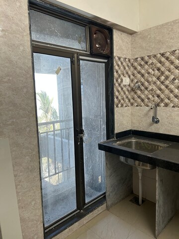 Kitchen in 2 BHK Apartment at Shree Sai Surya Kiran, Andheri West – for Rent