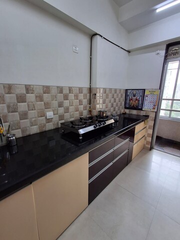 Kitchen in 3 BHK Apartment at Divine Aspen Garden, Goregaon East – for Rent