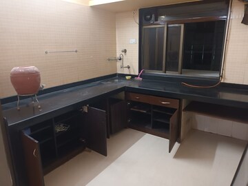Kitchen in 2 BHK Apartment at Paranjape Schemes Royal Court, Andheri East – for Rent