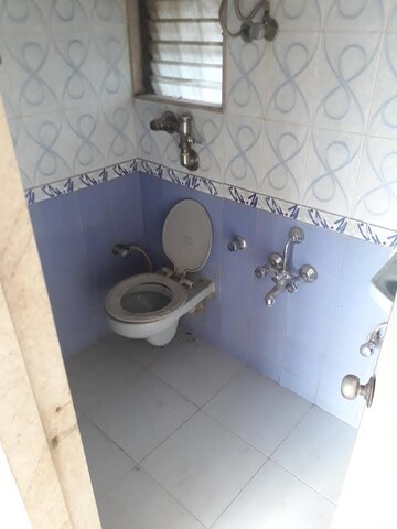 Bathroom in 1 BHK Apartment at Sonal Link Residency, Malad West – for Rent