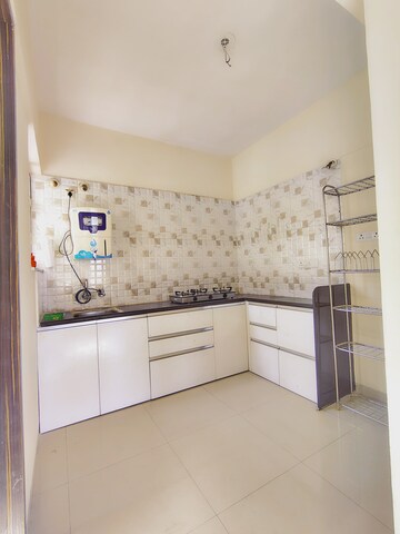 Kitchen in 2 BHK Apartment at Goyal My Home MH 14, Punawale – for Rent