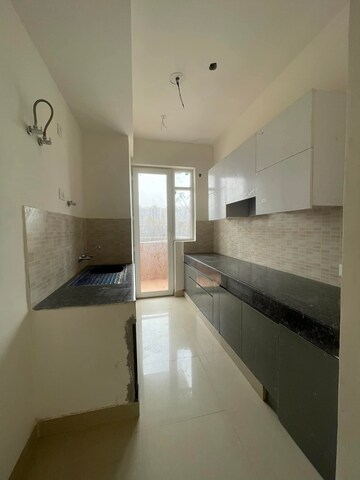 Kitchen in 3 BHK Apartment at Ansal Highland Park, Sector 103 – for Rent
