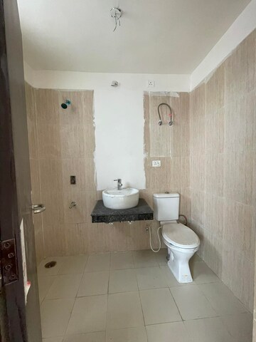 Bathroom in 3 BHK Apartment at Ansal Highland Park, Sector 103 – for Rent