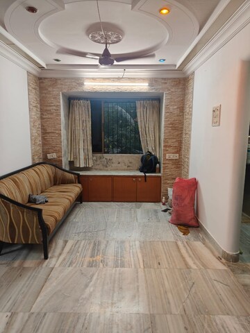 Living Room in 2 BHK Apartment at Pleasant CHS Malad, Malad West – for Rent