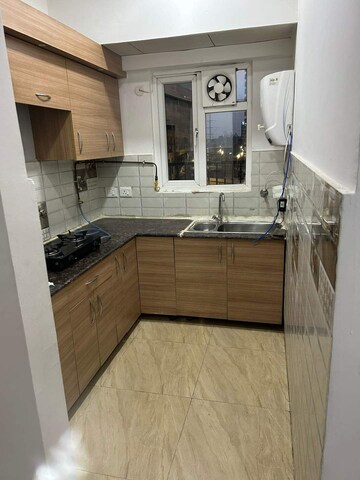 Kitchen in 2 BHK Apartment at Gaur City 7th Avenue, Sector 4, Greater Noida – for Rent