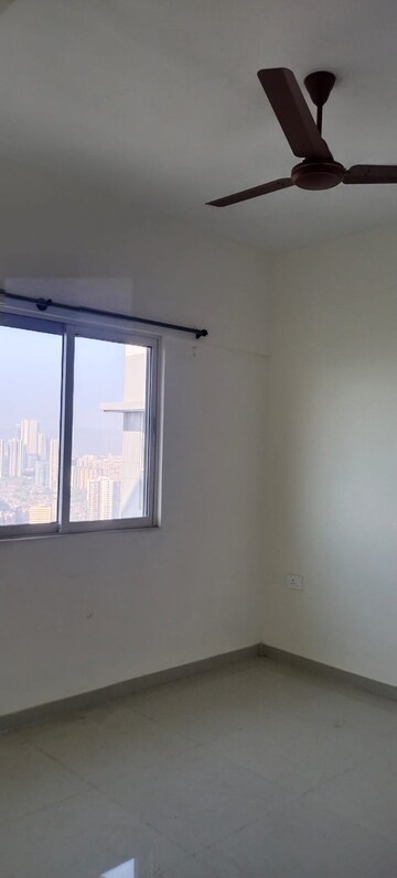 Room in 2 BHK Apartment at Omkar Signet, Malad East – for Rent