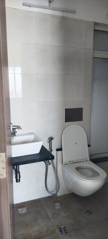 Bathroom in 2 BHK Apartment at Omkar Signet, Malad East – for Rent