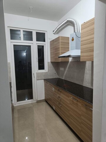 Kitchen in 2 BHK Apartment at Gaur City 7th Avenue, Sector 4, Greater Noida – for Rent