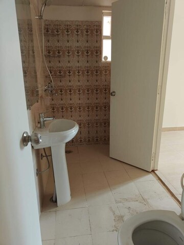 Bathroom in 3 BHK Apartment at Gaur City 7th Avenue, Sector 4, Greater Noida – for Rent