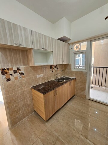 Kitchen in 3 BHK Apartment at Gaur City 7th Avenue, Sector 4, Greater Noida – for Rent