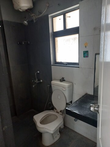 Bathroom in 2 BHK Apartment at Gulmohar Goldcoast, Kharadi – for Rent