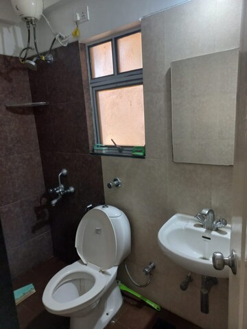 Bathroom in 2 BHK Apartment at Gulmohar Goldcoast, Kharadi – for Rent