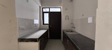 Kitchen in 2 BHK Apartment at Cosmos Express 99, Sector 99 – for Sale