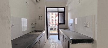 Kitchen in 2 BHK Apartment at Cosmos Express 99, Sector 99 – for Sale