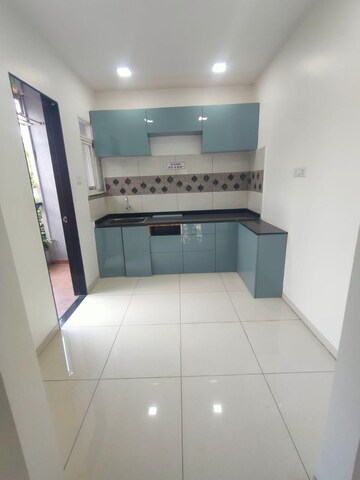 Kitchen in 2 BHK Apartment at Shewalwadi – for Sale