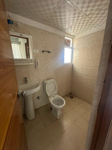 Bathroom in 2 BHK Apartment at Windsor Paradise 2, Raj Nagar Extension – for Rent