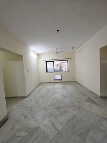 Room in 2 BHK Apartment at NRI Complex Phase I, Seawoods Sector 58 – for Rent