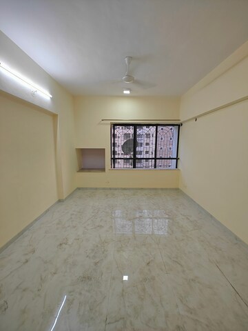 Room in 2 BHK Apartment at NRI Complex Phase I, Seawoods Sector 58 – for Rent