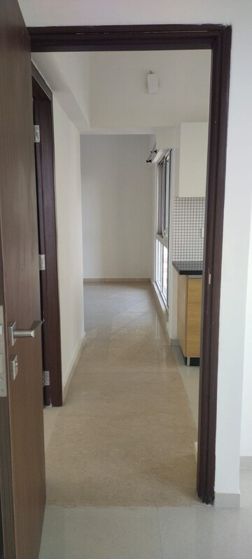Building Lobby in 2 BHK Apartment at Omkar Signet, Malad East – for Rent