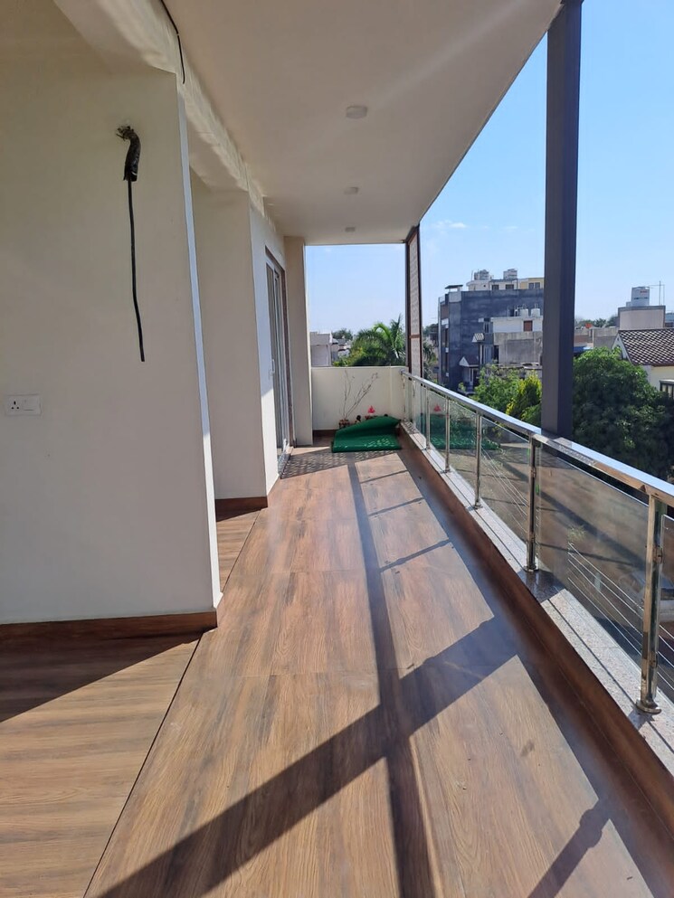 Balcony, ansal-api-esencia-wood-winds 4 Bedroom 300 Sq.Yd. Apartment In Sector 67 Gurgaon 8220412