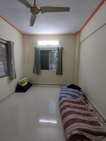 Bedroom in 2 BHK Apartment at Sairang Complex, Pimple Gurav – for Rent