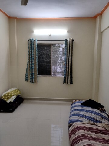Bedroom in 2 BHK Apartment at Sairang Complex, Pimple Gurav – for Rent