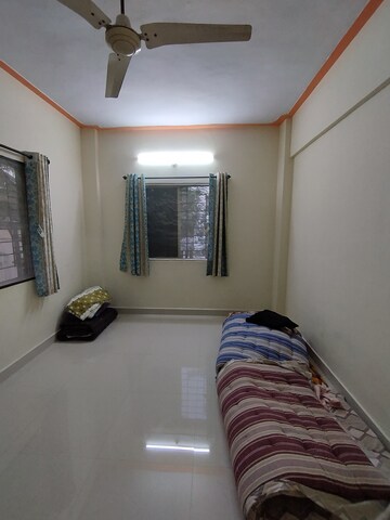 Bedroom in 2 BHK Apartment at Sairang Complex, Pimple Gurav – for Rent