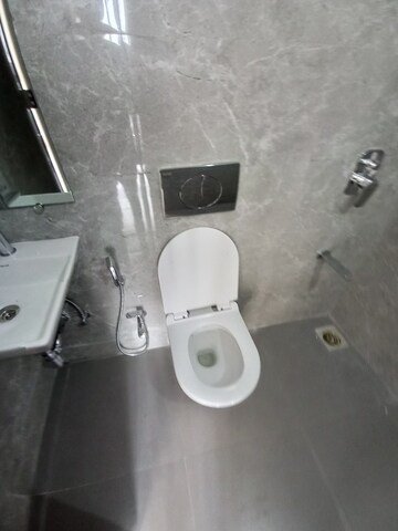Bathroom in 1.5 BHK Apartment at Dosti Oro 67, Kandivali West – for Rent