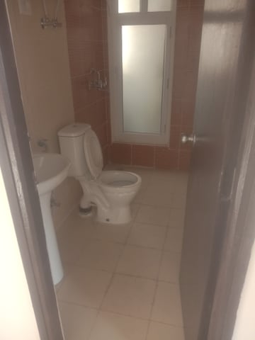 Bathroom in 3 BHK Apartment at Mahagun Mywoods, Sector 16c Greater Noida – for Rent