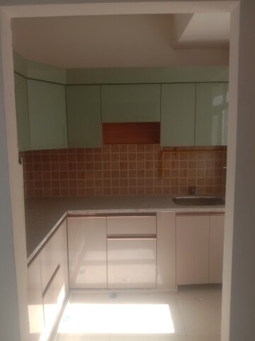 Kitchen in 3 BHK Apartment at Mahagun Mywoods, Sector 16c Greater Noida – for Rent