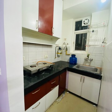 Kitchen in 1 BHK Apartment at Aditya Celebrity Homes, Sector 76 – for Rent