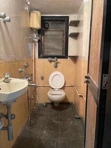 Bathroom in 1 BHK Apartment at MICL Ghatkopar Avenue Aaradhya One Earth Phase 2, Ghatkopar East – for Rent
