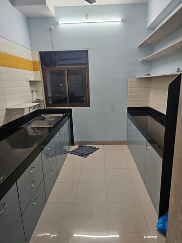 Kitchen in 3.5 BHK Apartment at Vijay Enclave, Waghbil – for Rent