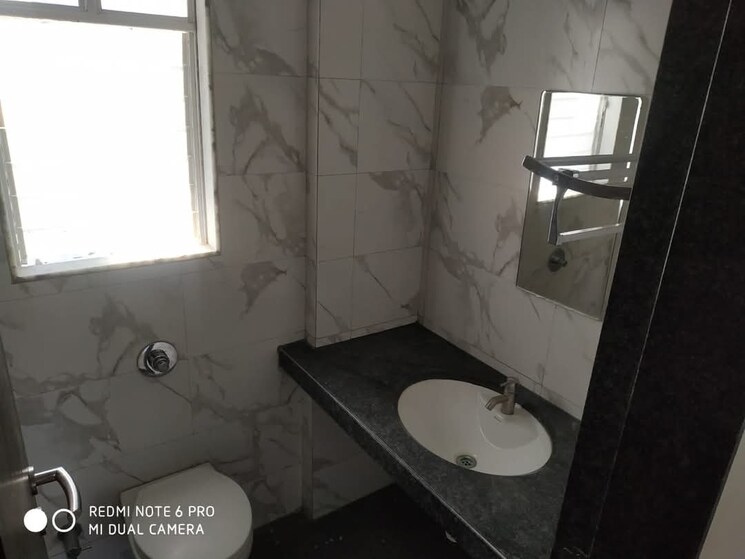 Bathroom, vasudha-sai-eshanya 2 Bedroom 900 Sq.Ft. Apartment In Balewadi Pune 8220961