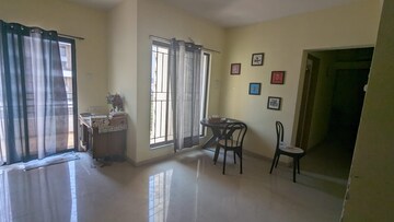 Living Room in 2 BHK Apartment at Solicia Apartment, Wagholi – for Sale